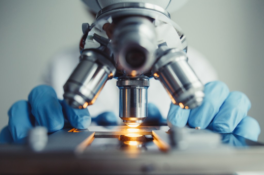 Detail of microscope in lab.